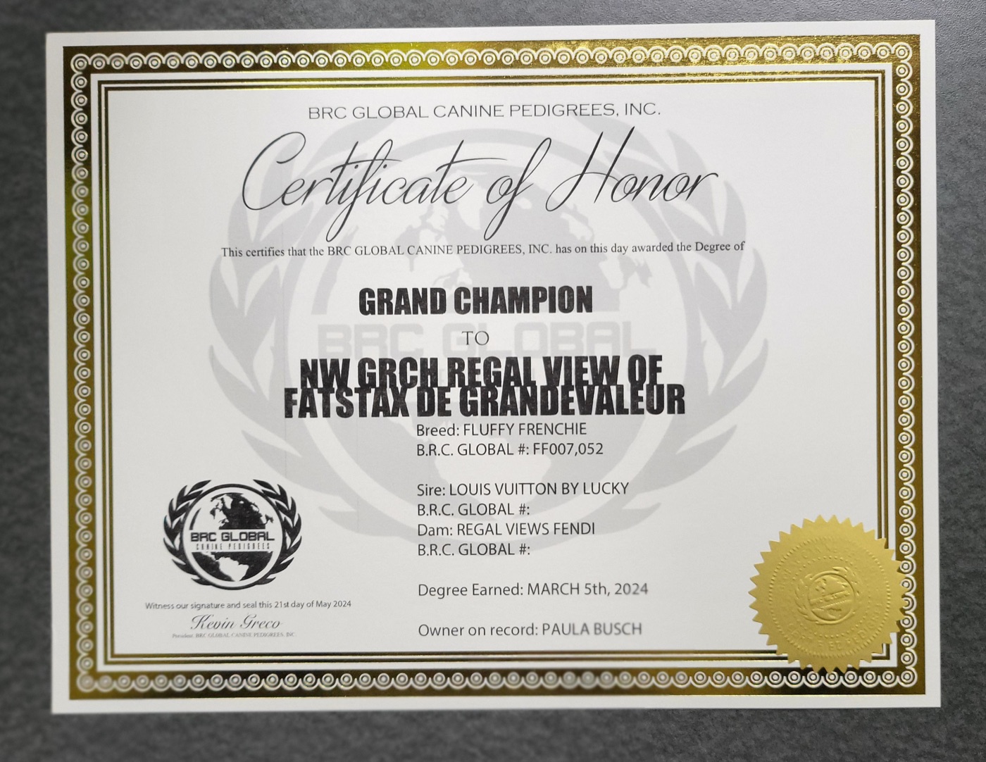 FatStax earning his Grand Champion title